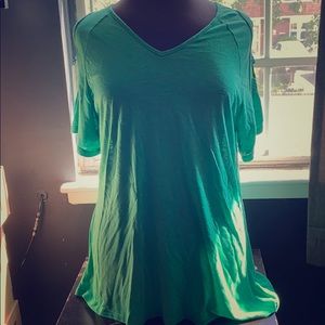 Green V-neck shirt with pattern on the side